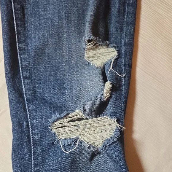 MOTHER Distressed Flare Jeans in Blue - Picture 9 of 13